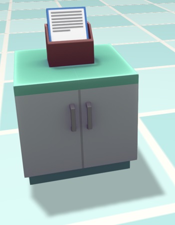 Een kastje met daarbovenop een houten bakje. In dit bakje zitten de 'Flash Cards'.