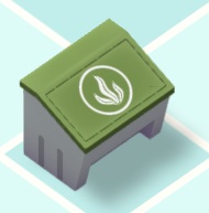 Een 'green pellets'-voerdoos, met een donkergroen deksel waarop een omcirkelde Plant afgebeeld staat.