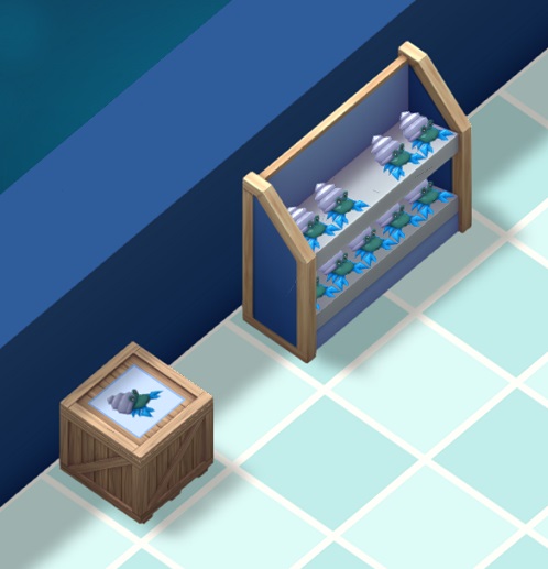 Links de Voorraadkist; rechts het Verkooprek, gevuld met Heremietkreeftspeeltjes. Het Verkooprek heeft twee schappen. Bovenop de Voorraadkist staat een speeltje afgebeeld.