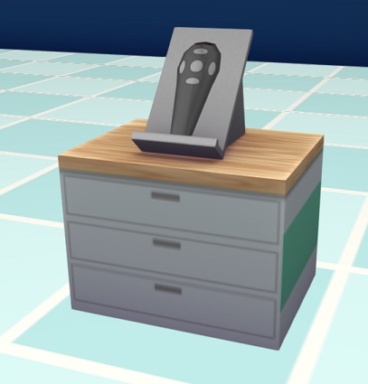 Een houten kastje, waarop een Laserpointer-toestelletje in zijn omhulling ligt.