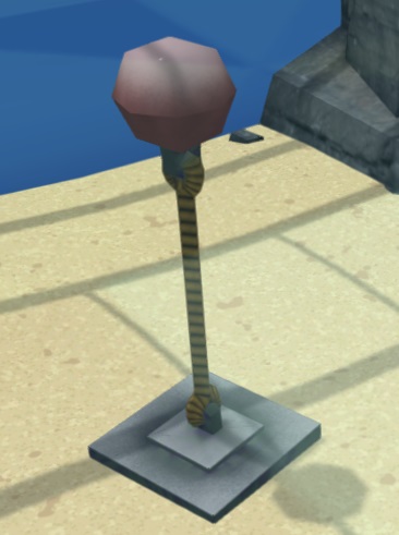 Een dik touw staat rechtop op de Aquariumbodem, dankzij een donkerrode 'ballon' aan het bovenuiteinde van het touw.