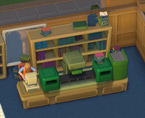 Vogelperspectief van een Giant Library Reception met Assistent. De Giant Library Reception is een enorme 'toonbank' met links een computer, en middenin een lopende band tussen twee groene dozen en een scantoestel in het midden van de transportband. Rechts staat een doos in de vorm van een enorm boek. Achter de toonbank staat een Boekenrek vol boeken. De Assistent werkt aan de computer.