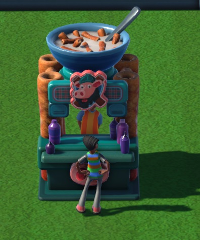 Vogelperspectief van een Hog-Logs Kiosk, waar een Class Clown-Student Hog-Logs koopt. De Kiosk heeft bovenaan het Hog-Logs logo: een varkenskop met helm. Op het dak staat een vergroot kommetje van Hog-Logs in melk, met een lepel erin. De Kiosk is groenblauw van kleur.