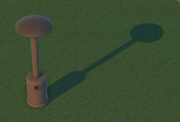 Vogelperspectief van een grijze Patio Heater: een lange 'paal' met ronde afdekking bovenaan. In de 'sokkel' staat een rood lampje.