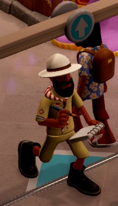 Beavis De Beavoir is gekleed als een Ontdekkingsreiziger, met tropenhelm op het hoofd en een scouts-achtige rood/witte halsdoek. Hij loopt op de foto langs de verkeerde kant van een éénrichtingsingang...