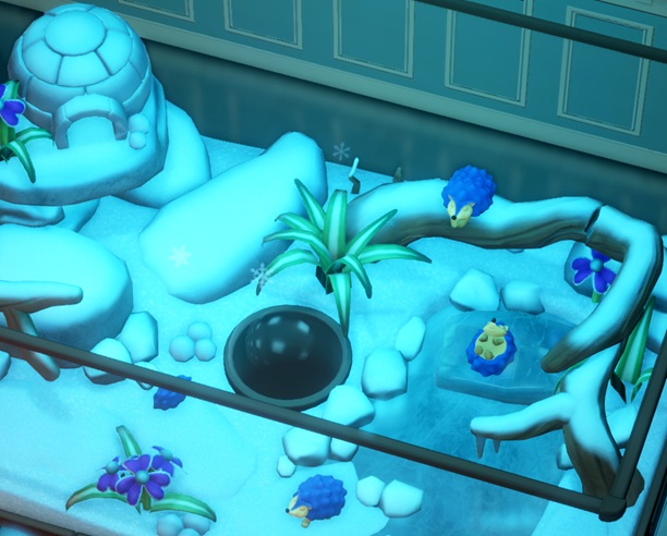 Vier Blue Hedgehogs in hun Terrarium. Eén Egel rolt op zijn zijkant aan de linkerkant, de drie anderen slapen. Linksboven staat een mini-iglo en in het midden is er een Viewing Dome te zien.