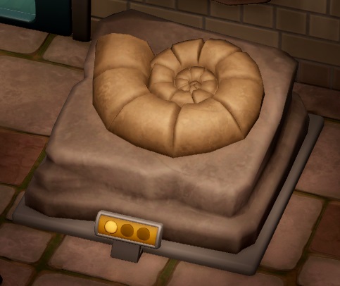 Het Helix Fossil ziet eruit als de schelp van een Ammoniet, 'gefossiliseerd' in steen.