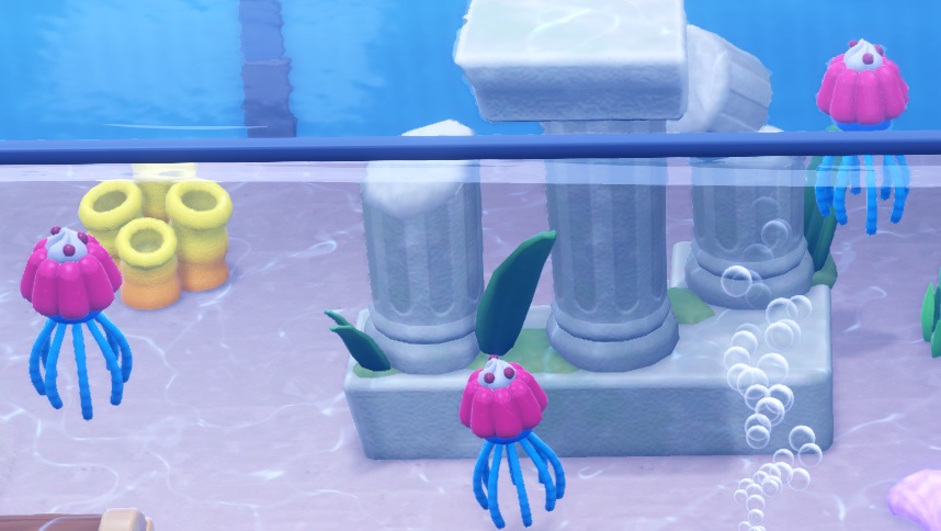 Een Aquarium met drie Jellyfishes. Het schijfvormige lichaam is vervangen door een Jellydessert.