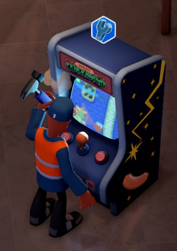 Een Conciërge gaat een haperende Meat Wizard-spelautomaat te lijf met een hamer. De spelautomaat heeft knoppen die op salamischijfjes lijken en een joystick. Op de zijkant staan afbeeldingen van een lange bliksemflits en (onderaan) een worstje.