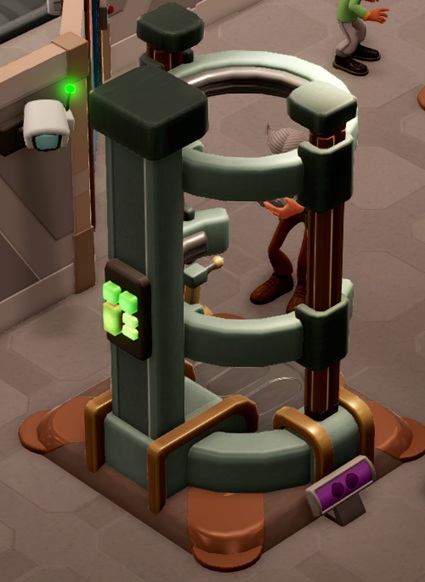 De Robo Mod-Stop II heeft t.o.v. versie 1 een extra horizontale metalen ring aan de bovenkant. Achter de Machine is een Professor nog net zichtbaar; links is ook een Veiligheiscamerate zien.