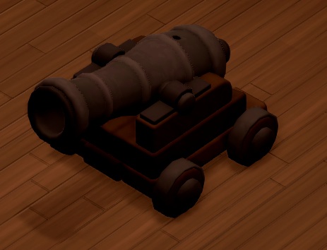 Een typisch zeeroverskanon, gemonteerd op een houten, vierwielig karretje.