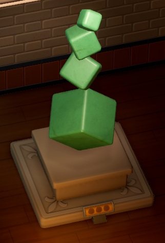 Vogelperspectief van een Sculpture (beeldhouwwerk). Het beeld bestaat uit een 'toren' van vier groene kubussen, die kleiner worden naar de top. Iedere kubus is met een hoekpunt verbonden aan de kubus daaronder; de kubussen staan niet netjes rechtop, maar gedraaid en gekanteld.