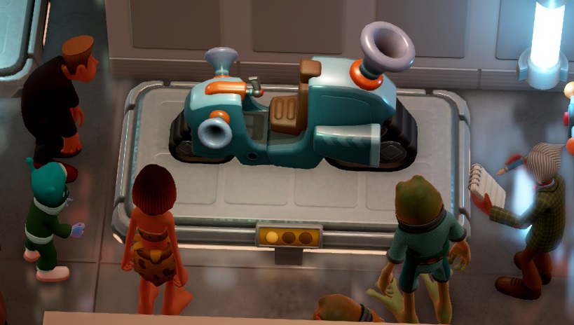 De Space Scooter is een 'brommer' op rupsbanden, met de uitlaat naar boven gericht. Diverse Bezoekers verzamelen zich rond de Scooter.