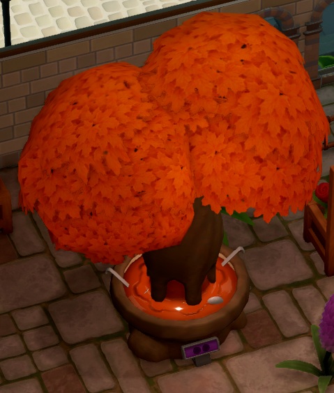 De Syrup Tree is een Boom met een oranje, dubbele kruin. De stam staat in een pot, gevuld met stroop, met enkele pollepels erbij.