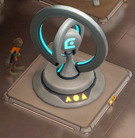 De Therasonic Amplifier bestaat uit een centrale verticale as, met twee verticale metalen concentrische ringen die rond die as draaien. Een Frogborne-Bezoeker bekijkt alles van links.