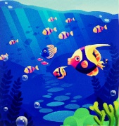 Een school Vissen zwemt net onder de waterspiegel. Diverse bubbels zweven in het water.