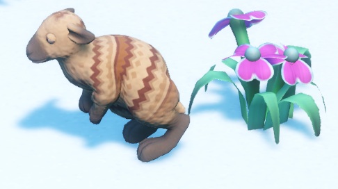 Een Woolly Jumper - een Kangoeroe met patronen in zijn vacht - springt voorbij. Rechts staan enkele roze bloemen.